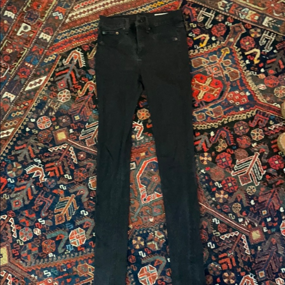 Worn black skinny jeans